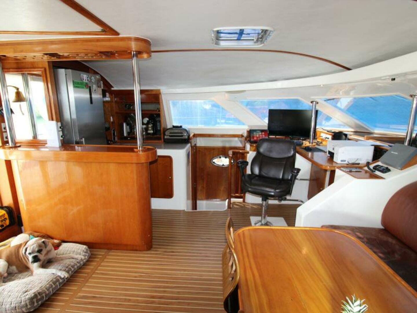Helm and salon aboard Walk the Plank